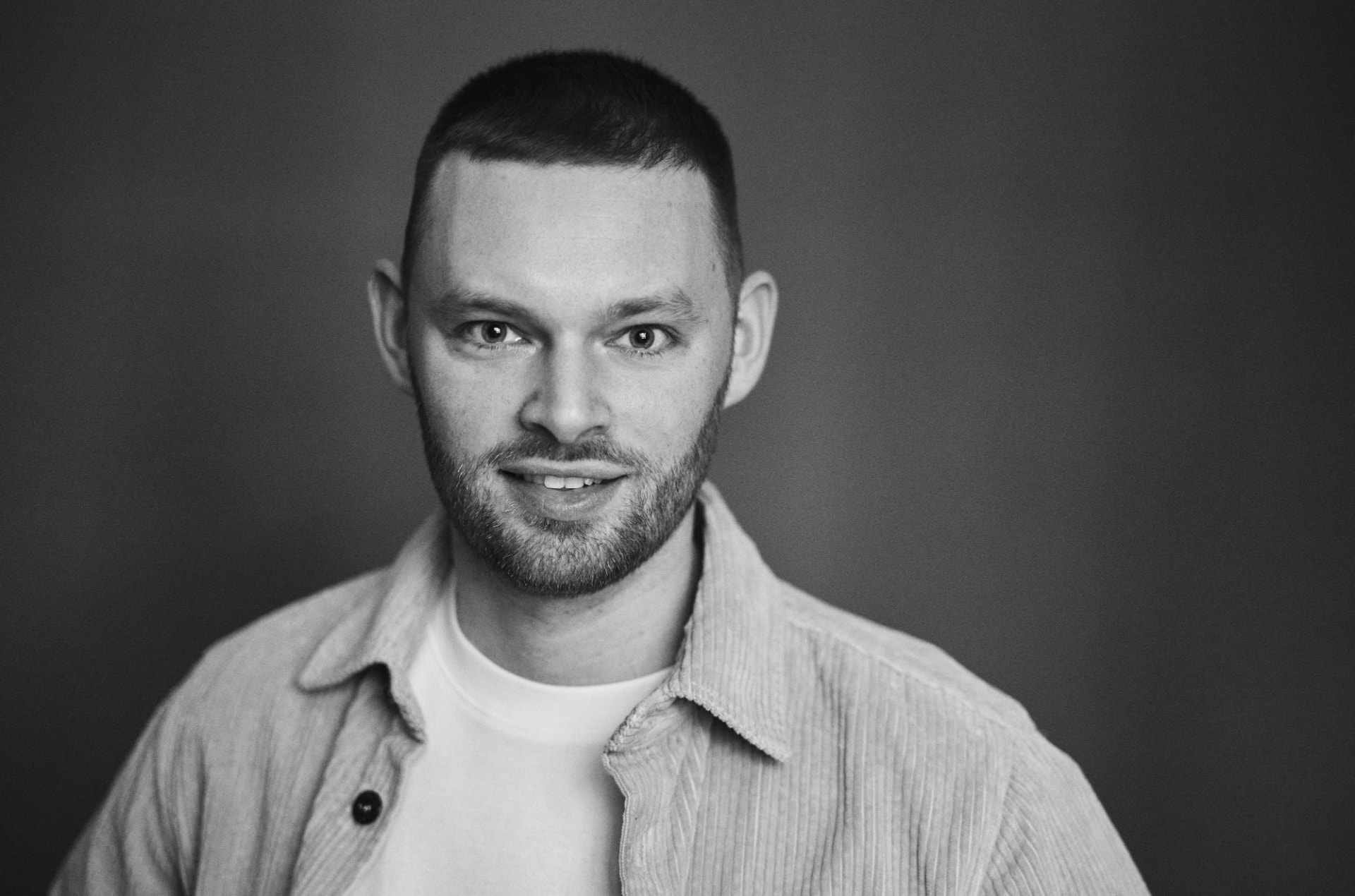 Editorial press portrait of James Hacking